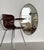 Original oval wall mirror with brass frame from Italian production of the 1960s-1970s. The crystal glass was renewed and...