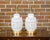 A pair of white porcelain vases with pierced geometric décor from circa 1920 made into table lamps wired for the USA and...