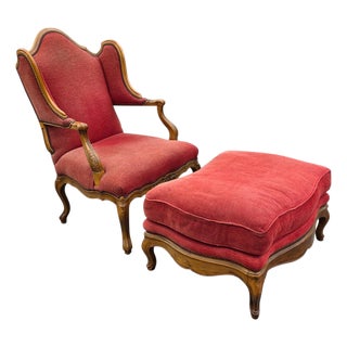 Vintage Baker Furniture French Provincial Louis XV Carved Walnut Oversized Wingback Fauteuil & Ottoman, Circa 1960s, Requires Reupholstery For Sale