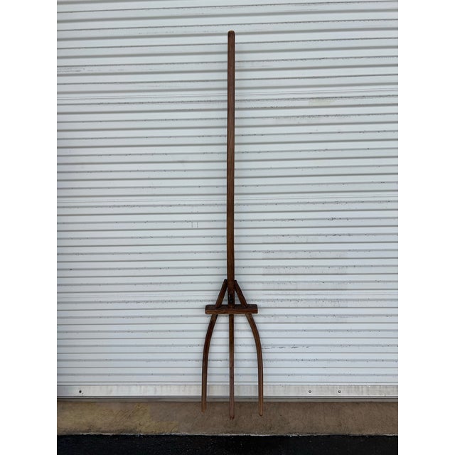 This is an antique wooden hay fork used as a primitive farm tool. Handmade using traditional techniques. Could have been...