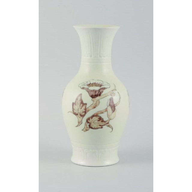 Jo Hahn Locher (1876-1960) for Bing & Grøndahl. Unique Art Deco vase decorated with branches and flowers. 1930s....