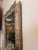 A beautiful French Louis Philippe mirror featuring a richly molded giltwood frame with elegant hand-carved detailing and...