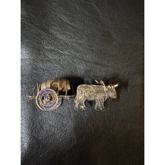 Antique Sterling & Enamel Fillagree Miniature, Tiny Ox Cart & Wood Barrow. Dimensions:3”w x 0.75”d x 1”h Condition:good...