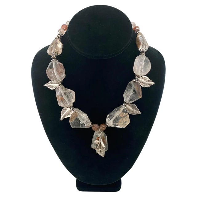 This is a Ferrous Quartz sterling necklace with charms. Nouveau Boutique created it with nine chunky (1.38 inch) quartz...