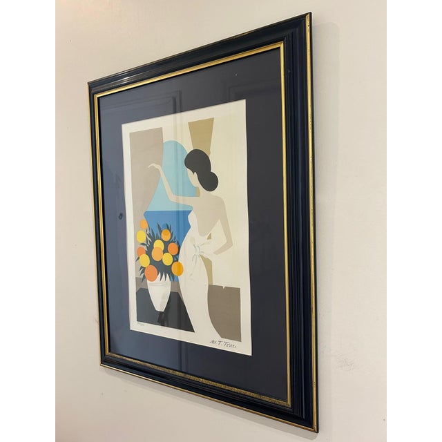 Original lithograph by the artist Maria Theresa Torres (M.T. Torres), depicting a stylized female figure with a bouquet of...