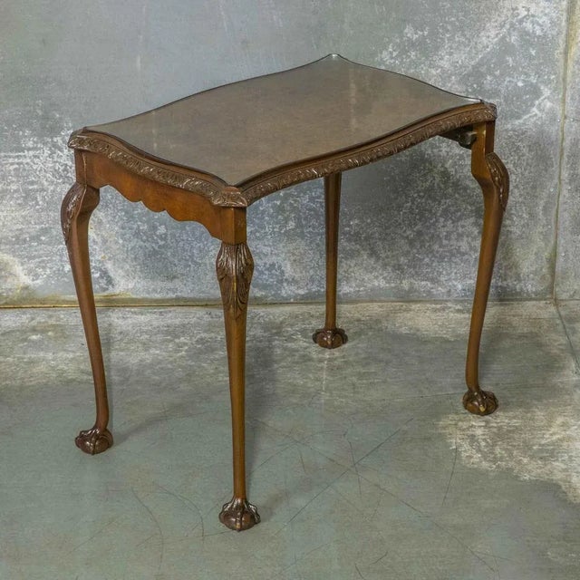 A nice set of three walnut tables with wonderful burr walnut veneered tops and still retaining their original glass...