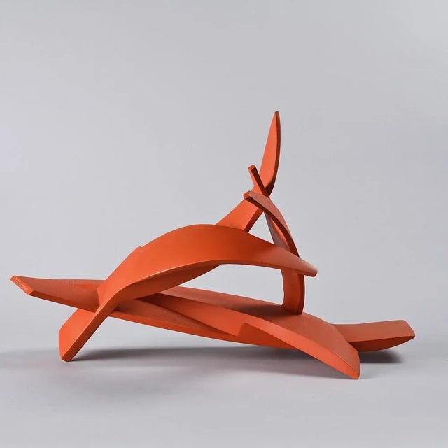 Abstract sculpture by Paolo Schiavocampo, created around 1970. Composed of interlocking and cut-out planes, the piece...