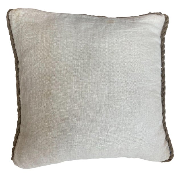 This pillow features a vintage-inspired, hand-embroidered floral design with earthy tones of mustard, sage, coral, and...