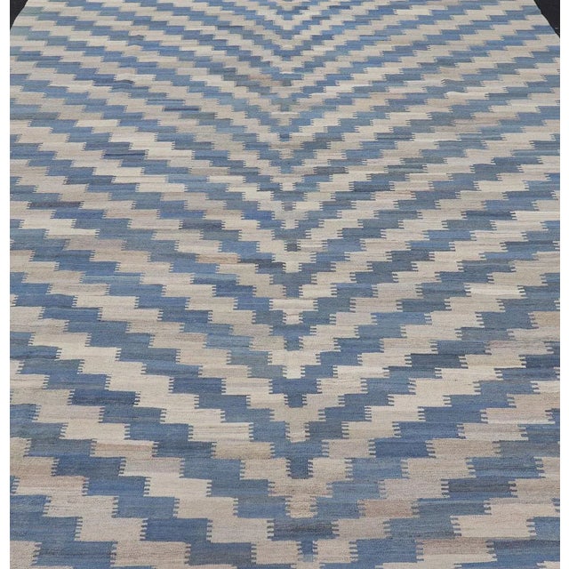 Modern flat-weave kilim rug with stripes in shades of light blue, blues, and creams. Keivan Woven Arts / rug AFG-88,...