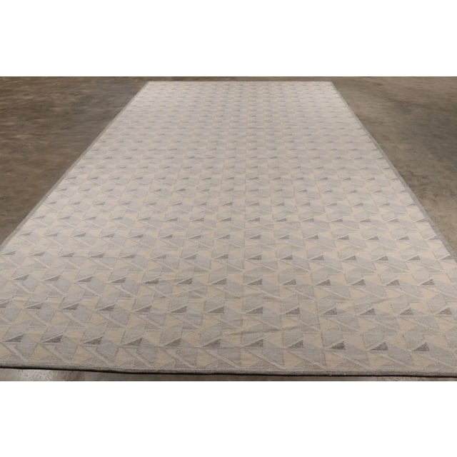 Handwoven in mohair and premium wool, this monumental 17x32 oversized contemporary flatweave joins Rug & Kilim’s...