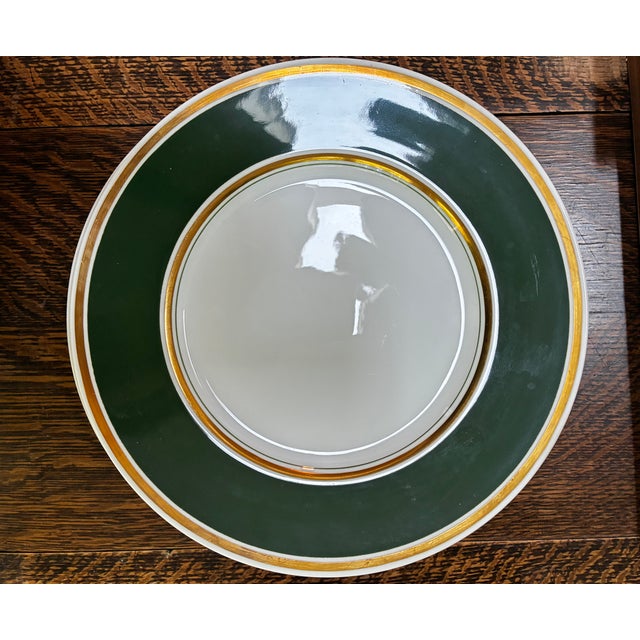 An exceptional and rare set of ten antique English fine bone china dinner plates, manufactured by the legendary Spode...
