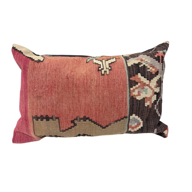 A superb custom-made old Turkish tribal kilim pillow cover featuring vibrant colors and striking geometric patterns. The...
