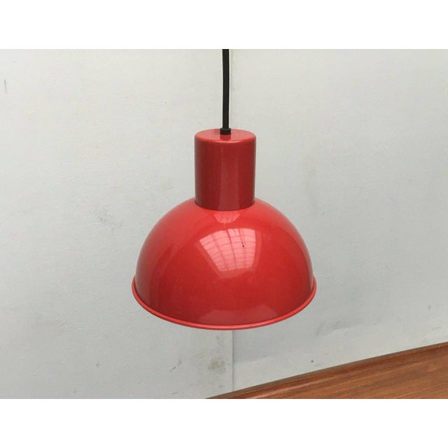 Bunker “Mini” pendulum from the Danish manufacturer Fog & Mørup after a design by Jo Hammerborg. Simple pendant lamp in...