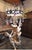 The image shows a vintage Italian classical-style table lamp featuring porcelain cherub figures and an ornate crystal-drop...