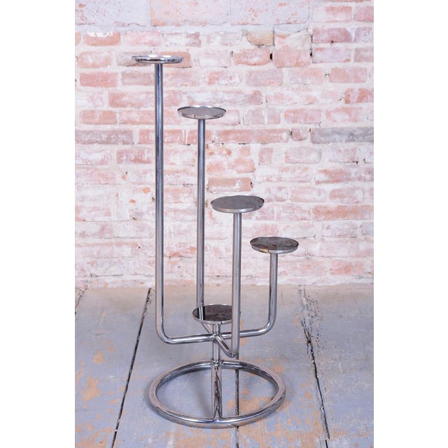 This elegant flower stand is an iconic representative of Czechoslovak functionalism and Bauhaus design from the 1930s. It...