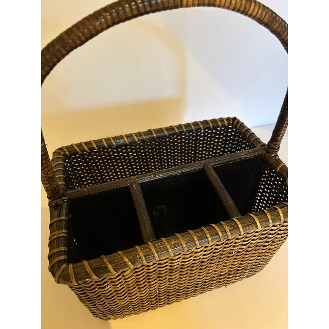Woven Rattan Wicker Utensil Holder with 4 sections. Holds forks, knives and spoons as well as napkins. Very sturdy with...