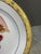 This plate is part of the Muirfield Holiday Plate collection - Celebrity 9408. Featuring an angel in flowing crimson robes...