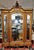 So classic of the Belle Epoch, this solid hand carved French walnut L. XV style 3 door armoire arranged as a hanging...