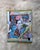 8.5" x 11" A mixed-media collage featuring the artist Frida Kahlo adorned in a maximalist style with colorful floral...