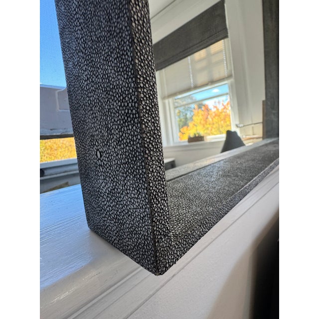 Beautiful rectangle mirror with an interior ledge. The frame is in a faux shagreen pattern with a charcoal finish and will...