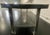 Vintage Style Metal Industrial Table on Wheels, circa 2000 For Sale - Image 4 of 4