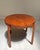 This is a versatile and beautiful tray table in solid teak. The table features a removable and reversible top that is...
