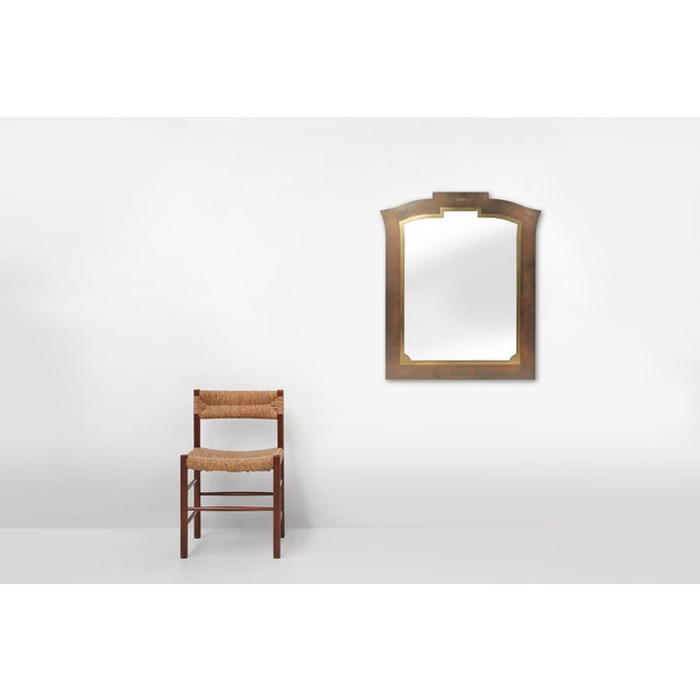 Large Hollywood Regency mirror of copper and brass produced by Belga Chrome Belgium around 1980. with duo tone inlay and...