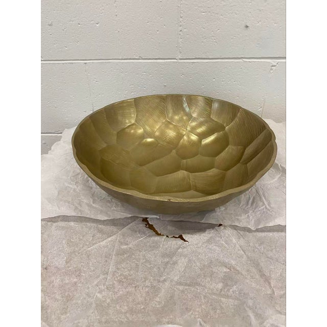 The Set of Two Gravar Bowls are stunning accent pieces that greatly enhance a space with their opulent Gold and Champagne...