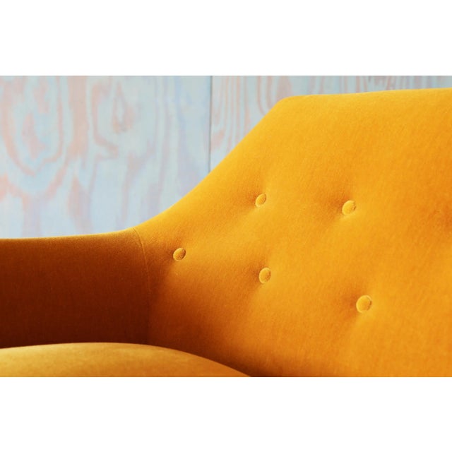 A deep modern lounge chair designed by Henry P Glass for J.L. Chase Co. for the forecast group. This example with a...