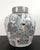 A large Chinese porcelain court ladies garden scene lidded jar, a large, finely formed, round, lidded vessel with gently...