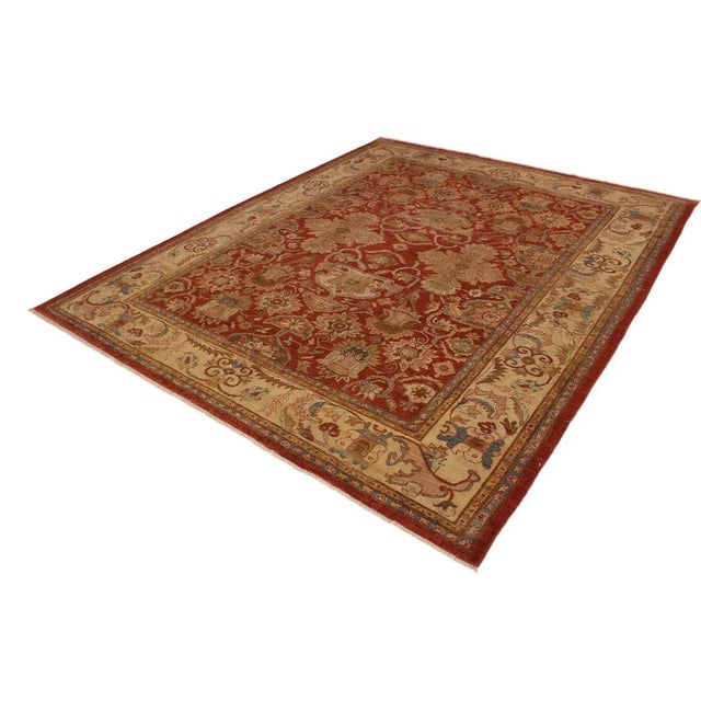 A Persian influenced Turkish hand knotted rug made by skilled artisans capable of creating the most exceptional vegetable...