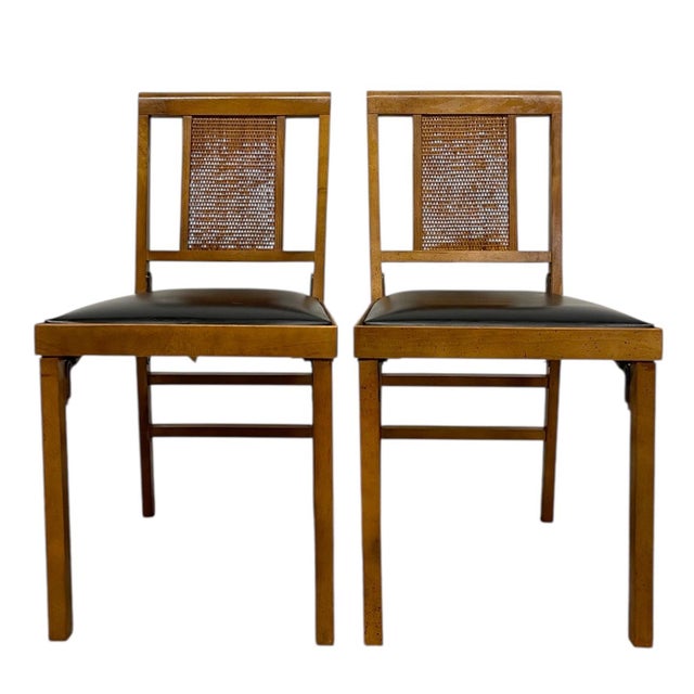 This set of two folding chairs was produced by Leg-O-Matic, a division of Lorraine Industries, Inc. Bridgeport,...