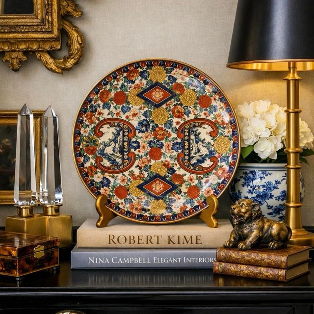 A striking 12.25-inch Japanese Imari charger, crafted in the Arita kilns during the Meiji era (circa 1870–1910) and...