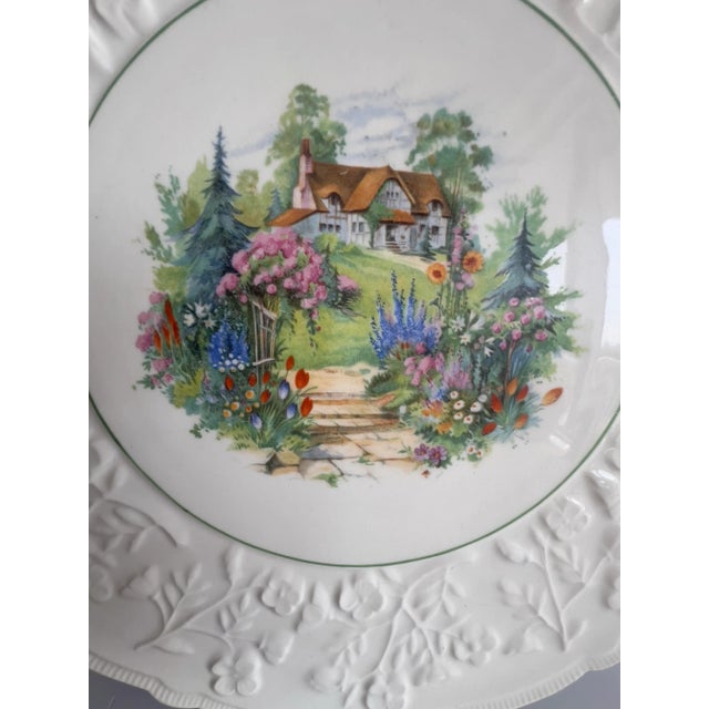 Beautiful Embossed Cake Plate with Cottage Scene and green trim. Made in Czechoslovakia 11"D x .25"H