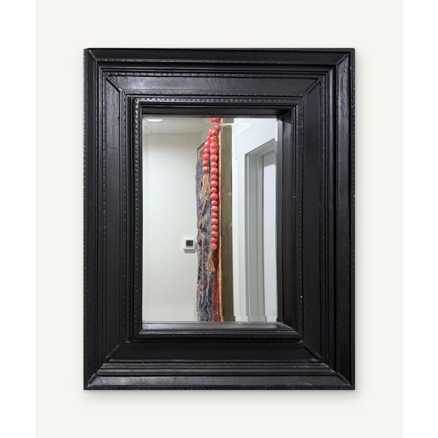 Maker unknown · refinished by Arturo Rovirosa · Black Wood Mirror. Carved wood frame painted black; mirror · 35 x 30 in. A...