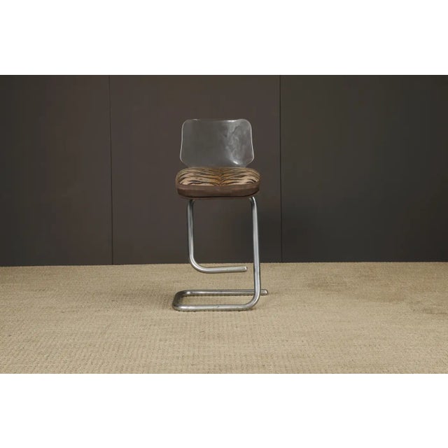 Playful, sculptural, and unmistakably bold, this pair of Italian cantilever barstools by Luigi Bardini, designed in the...