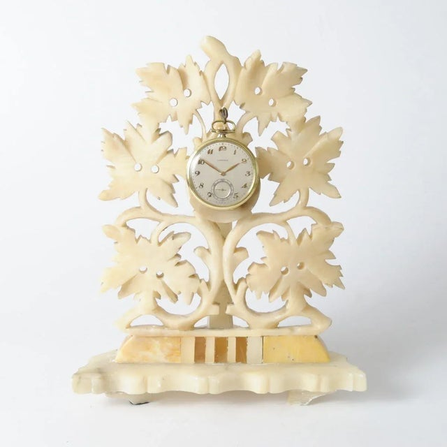 Hand-carved alabaster pocket watch stand. Made circa 1900 in Italy.