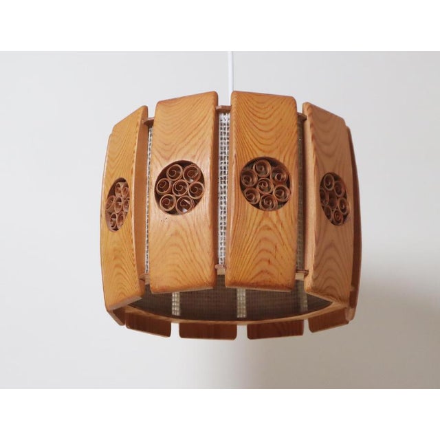This lovely Swedish pendant lamp gives off a warm, inviting glow that's perfect for setting a cozy atmosphere. Its soft,...