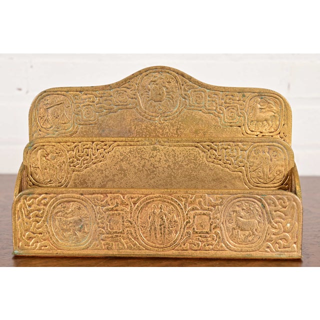 A gorgeous antique Arts & Crafts or Art Deco period gilt bronze "Zodiac" pattern desk letter holder rack By Tiffany...