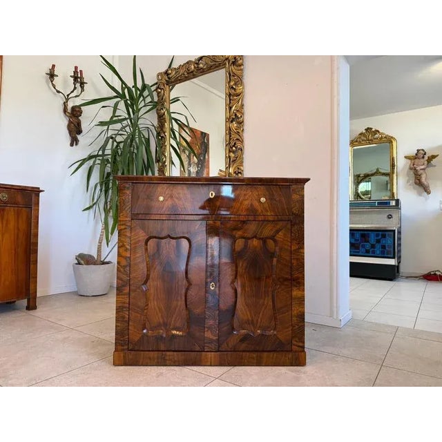 Restored Biedermeier Trumeau, Walnut Veneer. Dimensions: Height x Width x Depth 95 x 100 x 46 cm. For sale is a restored...