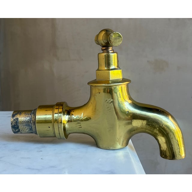 Large brass water spout / faucet made in France in the 19th century. Includes a top T-handle, the round connector measures...