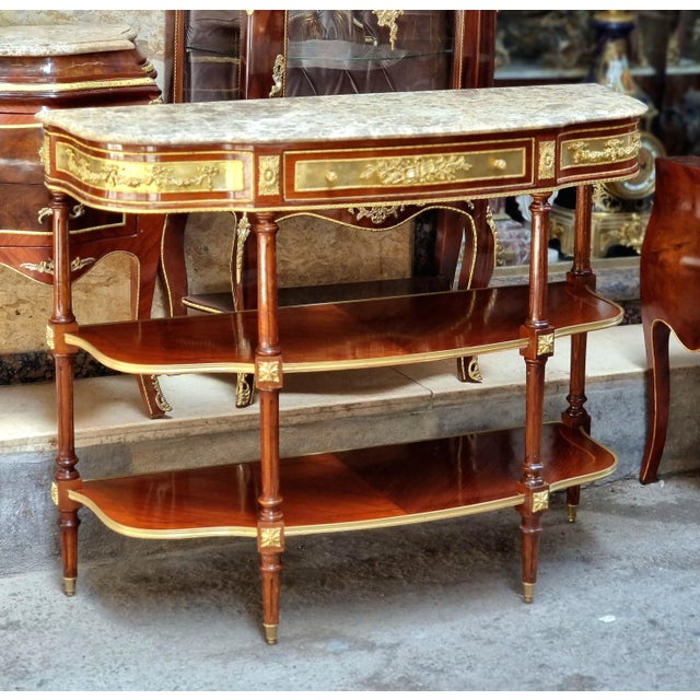 Enhance your home with the timeless elegance of this handcrafted French-style open console table. Expertly crafted from...