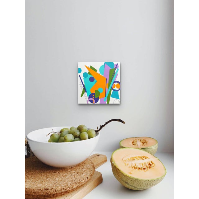 This artwork features a vibrant composition of geometric shapes and playful colors, creating a sense of spontaneity and...