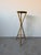 Beautiful vintage coastal pedestal stand crafted from natural bamboo and rattan, featuring a sculptural tripod base with...
