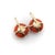 Circa the 1900’s, these pre-revolutionary Imperialist earrings center around gorgeous deep-orange coral oblong balls. The...