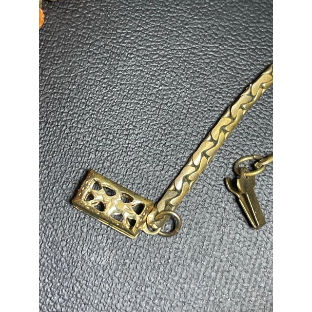 Mid Century Modern Carved Floral Faux Coral and Pearls on Textured Brass Chevron Chain and Orange Push Clasp For Sale In South Bend - Image 6 of 7
