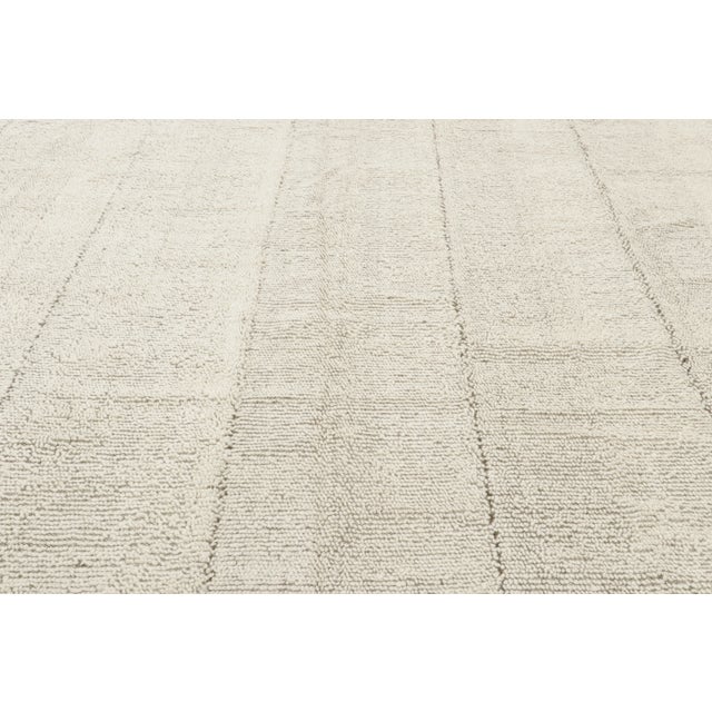 Hand-knotted in wool, circa 1950-1959, this oversized vintage shag rug is a highly tactile addition to Rug & Kilim’s...