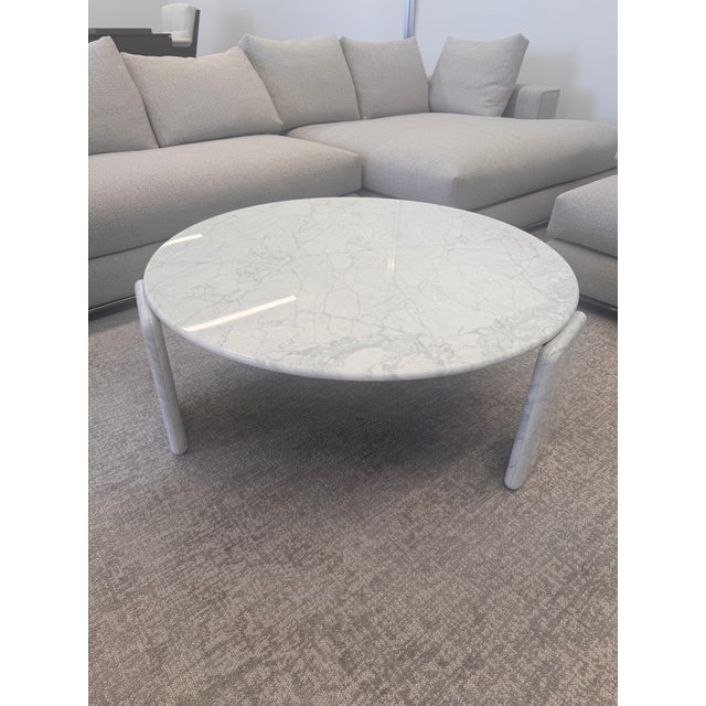 Authentic Minotti Drake round coffee table designed by Hannes Peer (2024 collection). All-marble construction in Bianco...