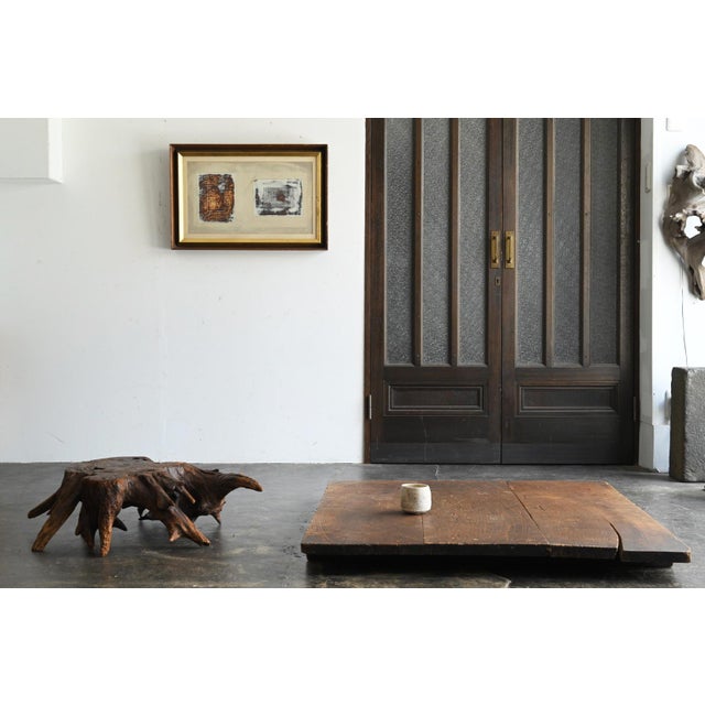 This is a richly characterful wooden board that worked hard for many years in the Japanese countryside. It is thought to...