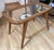 Cherry wood coffee table, from the Milanese school of the 1950s, in the style of Gio Ponti. This piece is designed in the...